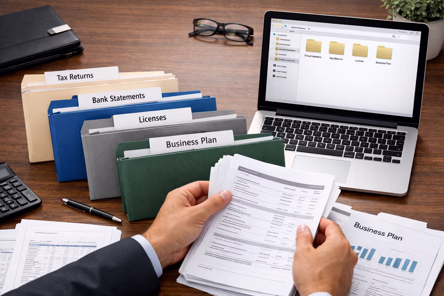 Organized business loan documents on desk